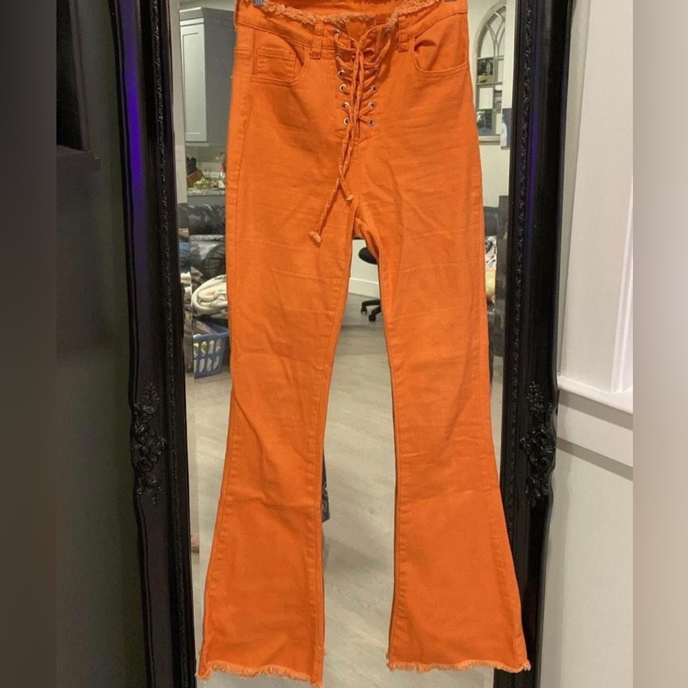 High waisted orange flare jeans